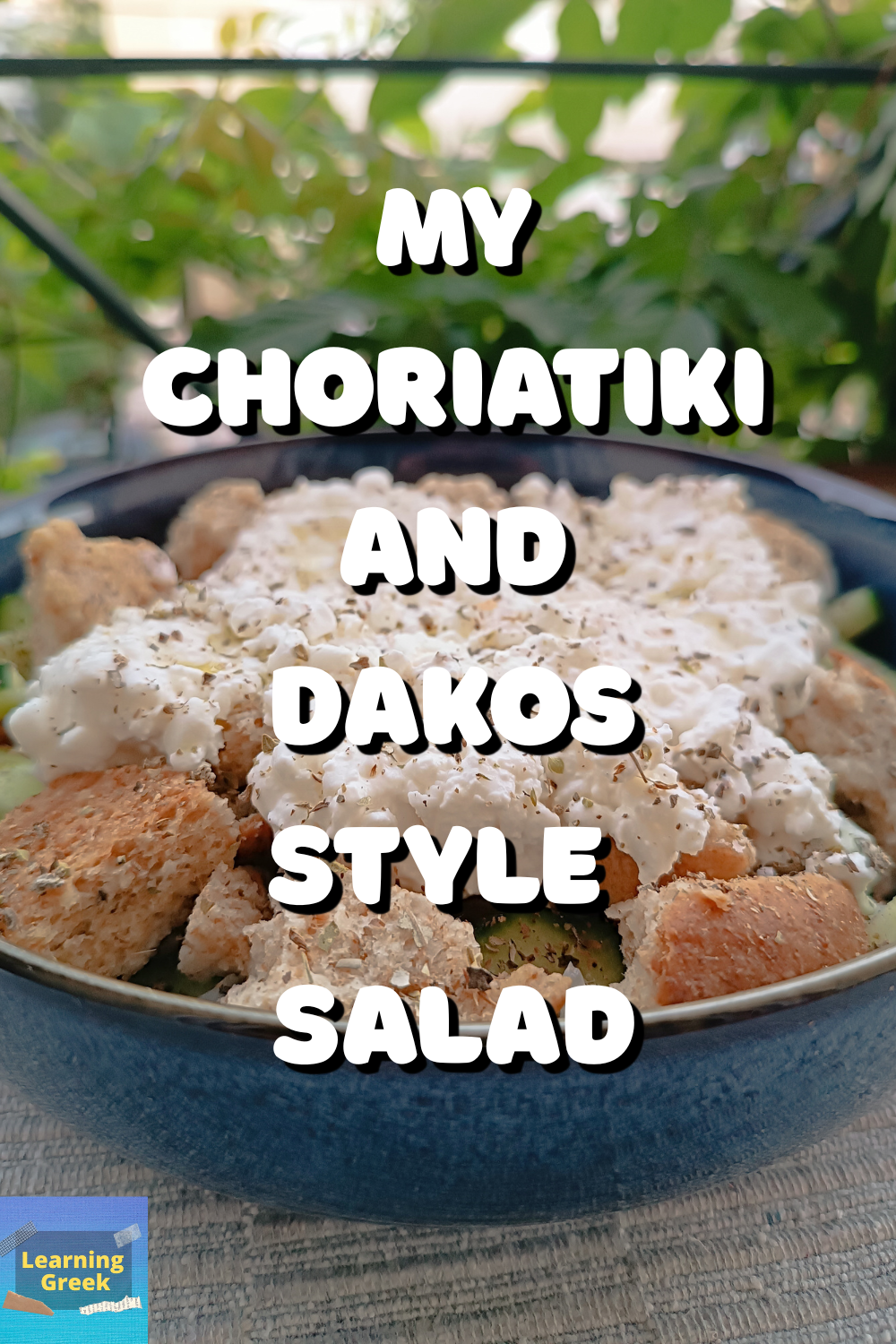 A bowl in a table with my choriatiki and dakos style salad ready to be eaten
